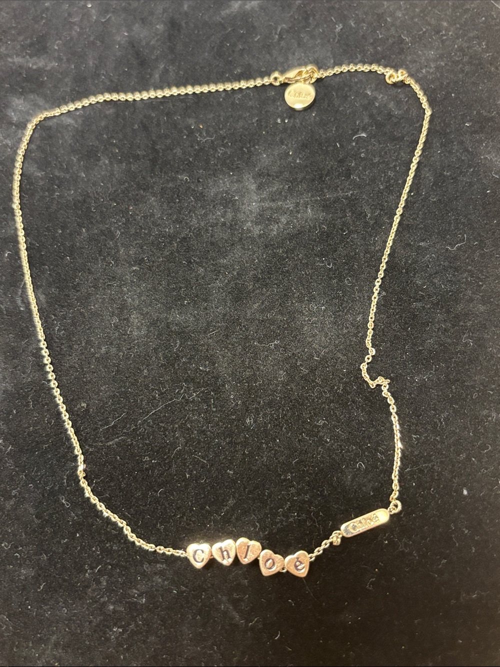 Chloe Gold-Tone 'LOVE' Heart Charm Necklace